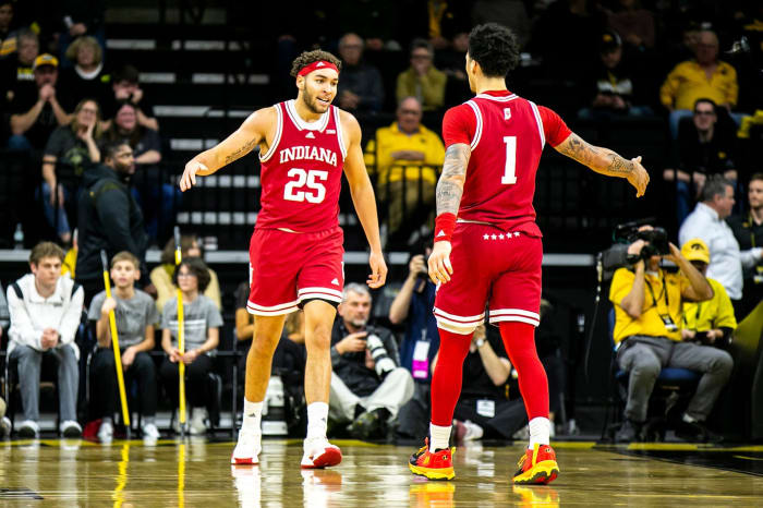 Indiana forward Race Thompson, left, high-fives Indiana guard Jalen Hood-Schifino (1) during a NCAA Big Ten Conference men's basketball game against Iowa.